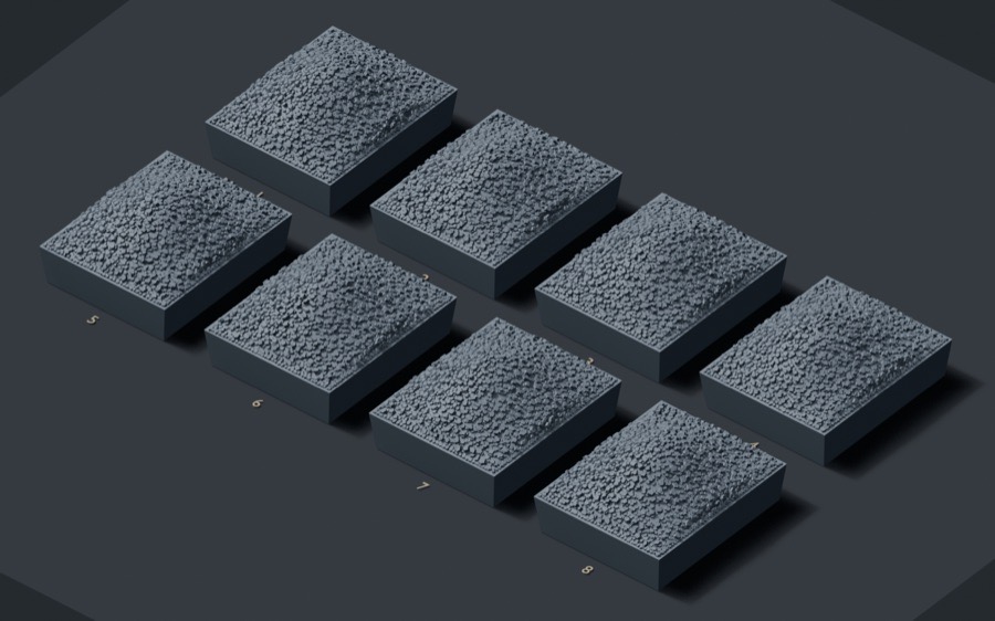 Render of all eight 3D-printable G scale coal loads, each a differently shaped heap of angular coal chunks